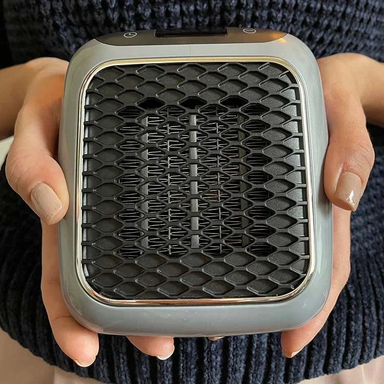 Kompakt varmeblæser på 800 W med timer