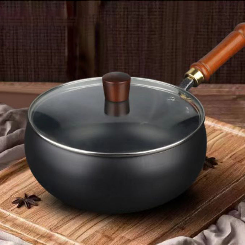 Wok i støbejern med låg, sort, ovnfast, 24 cm